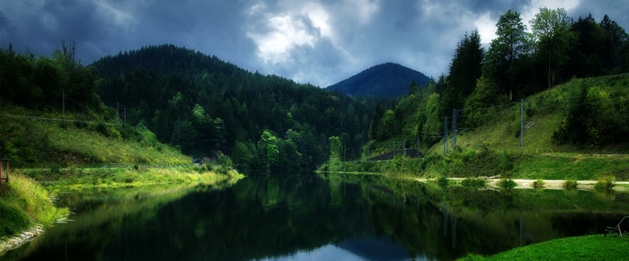 4K Nature Scene with Lake and Forest Reflection