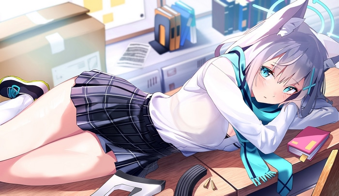 Shiroko from Blue Archive lying on a desk