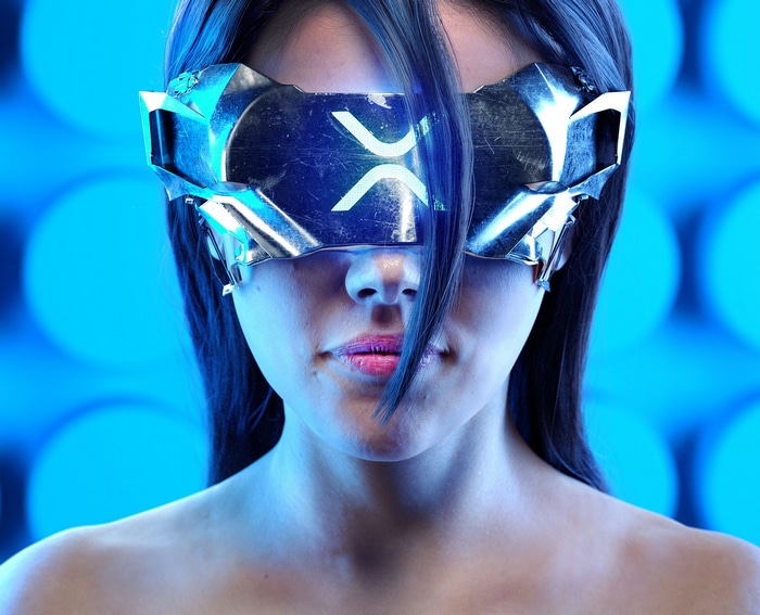 Woman wearing futuristic mask with XRP logo