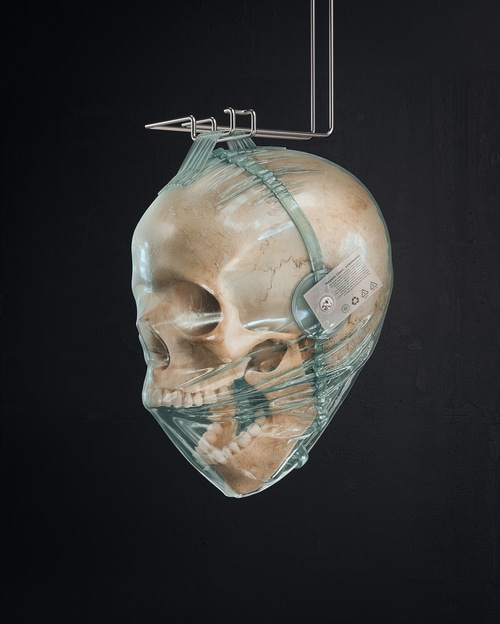 Skull wrapped in plastic by Anton Bessonov