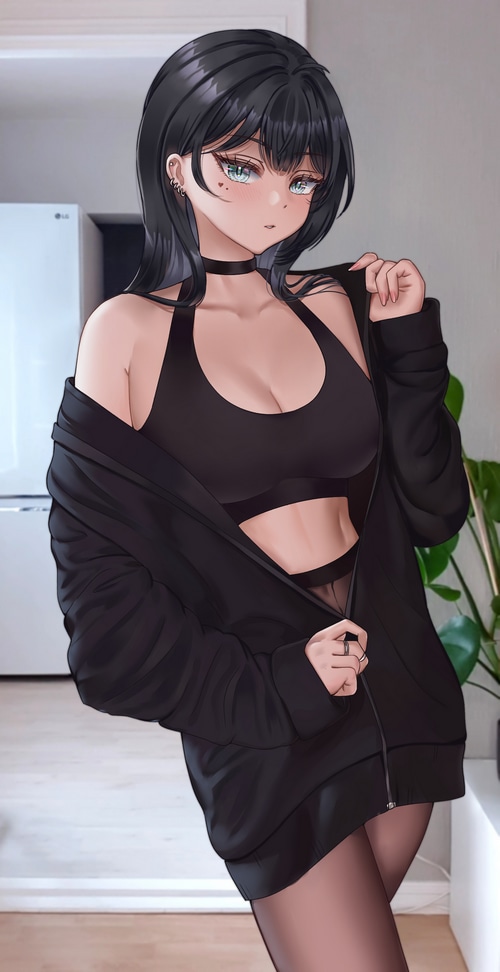 Wonni in a black sports bra and jacket