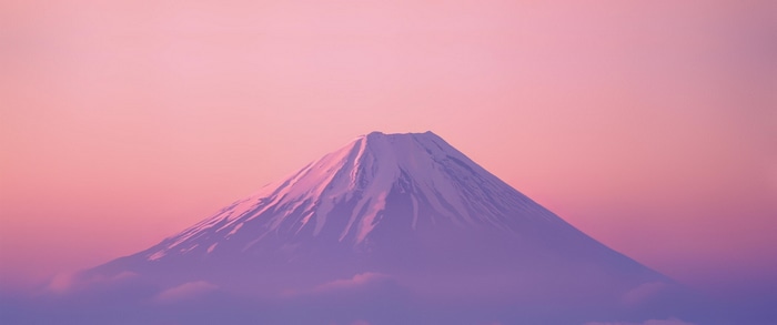 Mount Fuji at sunrise with pink sky