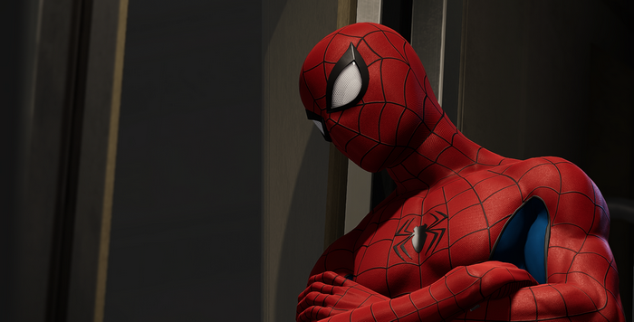 Spider-Man with arms crossed looking down