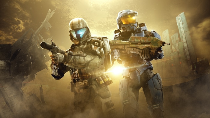 Halo soldiers with weapons in a desolate landscape
