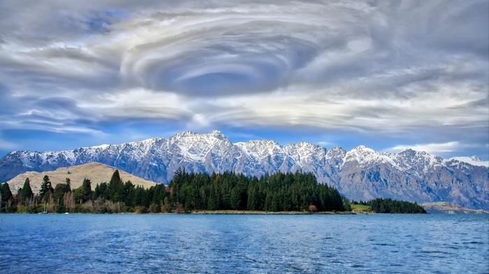 4K landscape of mountains and lake with unique clouds