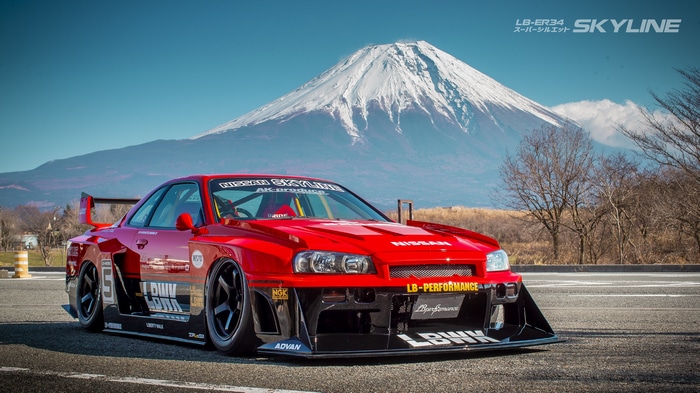 Red Liberty Walk Nissan Skyline R34 with Mount Fuji