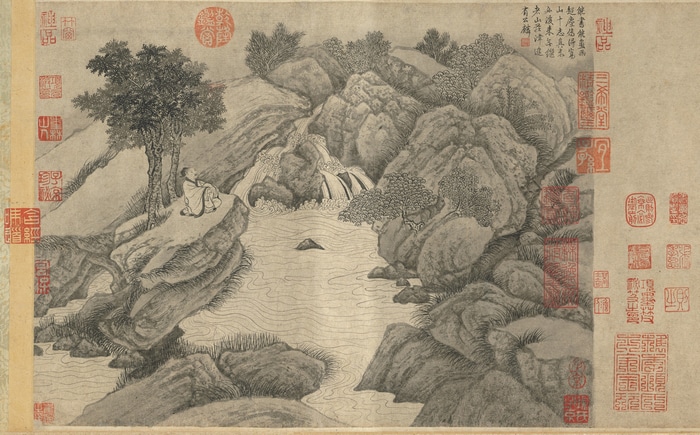 Chinese ink painting of a scholar by a waterfall