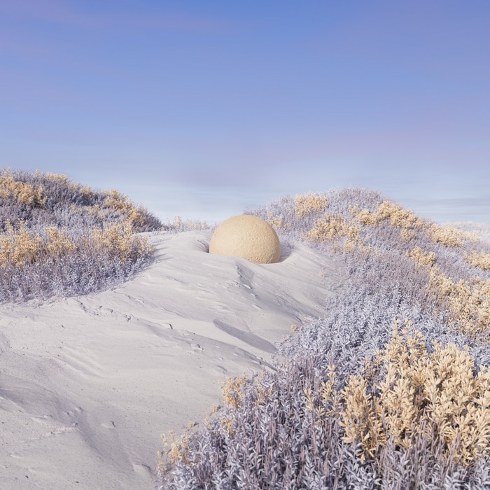 A surreal desert landscape with a large sphere