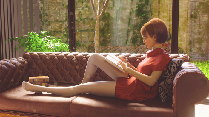 Woman reading a book on a couch