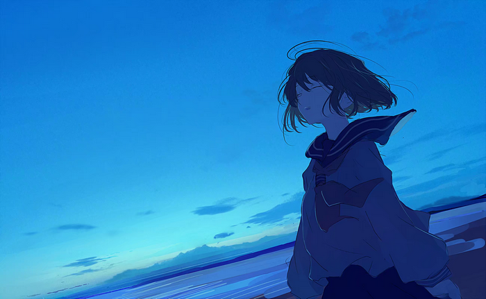 Schoolgirl in uniform against a blue sky