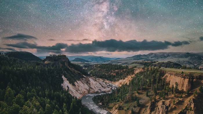 Milky Way over a River Valley and Mountains
