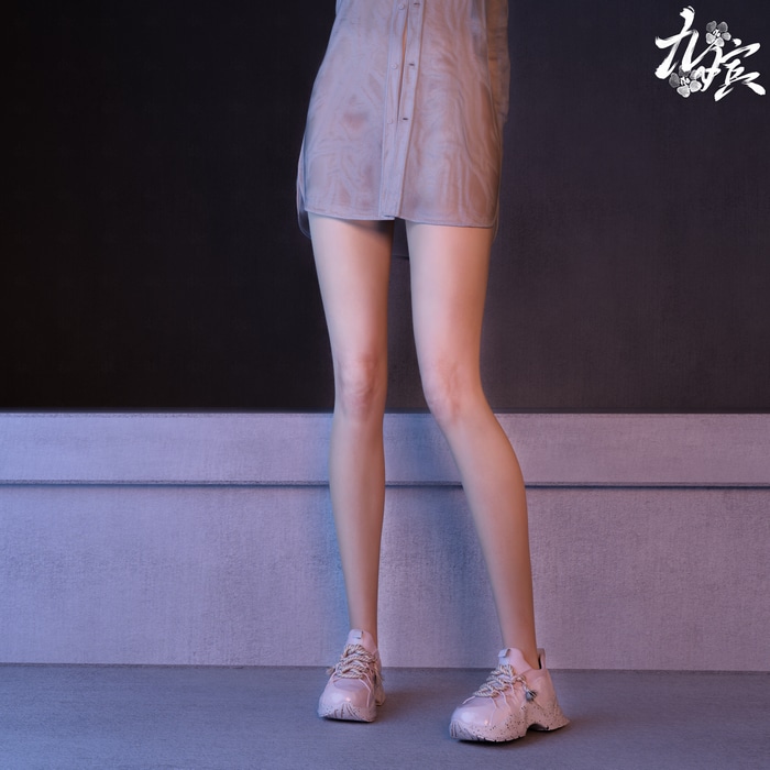 4K woman in sheer dress and white sneakers