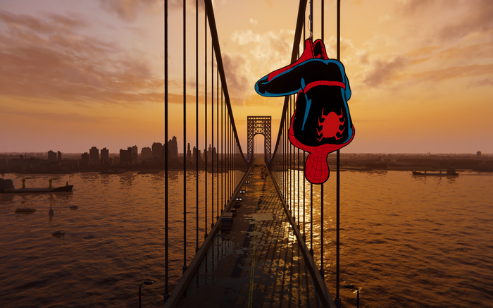 Spider-Man hanging from a bridge at sunset