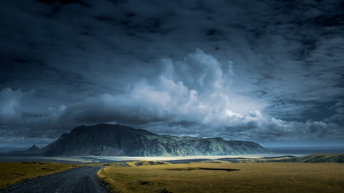 Icelandic landscape with mountains and a road