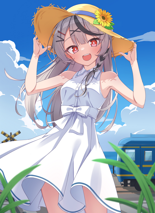 Girl in a white dress and straw hat by the train tracks