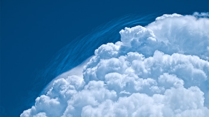 Blue sky with white cumulus clouds