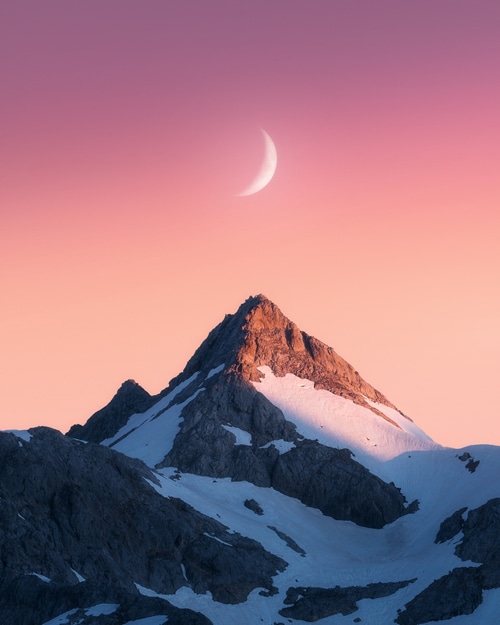 4K mountains with snow and crescent moon