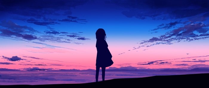 Silhouette of a girl against a colorful sky