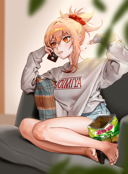 Yoimiya from Genshin Impact relaxing on a couch