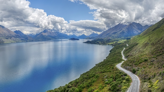 4K road along a lake with mountains in New Zealand