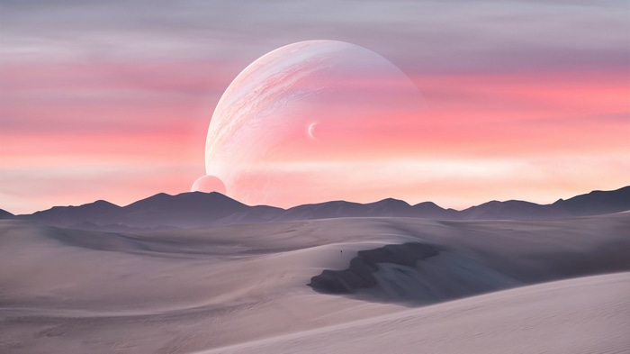 4K desert landscape with Jupiter and moons