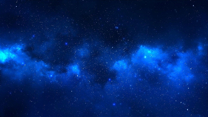 Starry night sky with blue nebulae