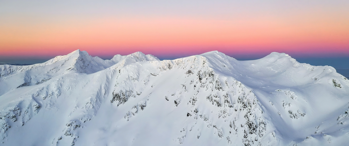 4K Snowy Mountains at Sunset