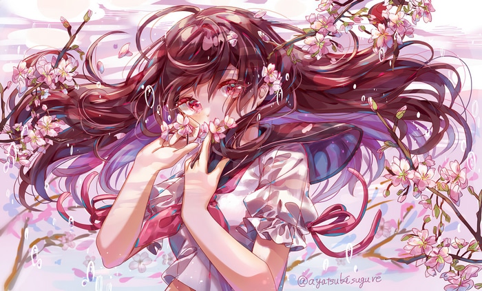 Girl in school uniform with cherry blossoms