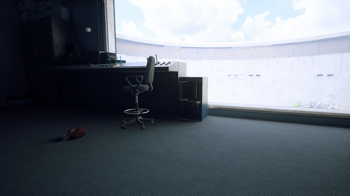 Stray: A cat sleeps in a futuristic control room