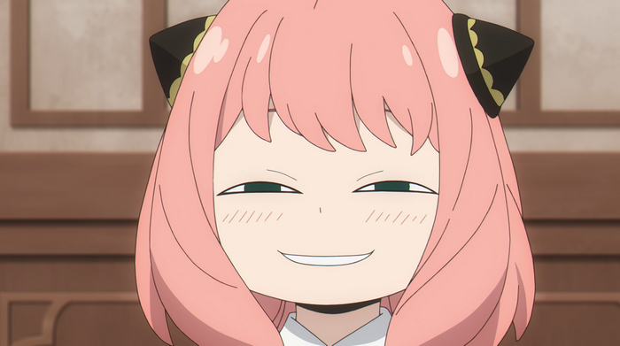Anya Forger smiling with pink hair and cat ears