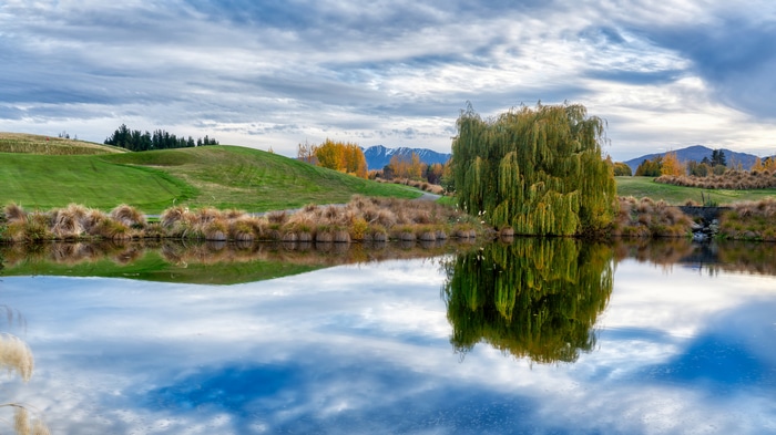 4K New Zealand landscape with mountains and reflection