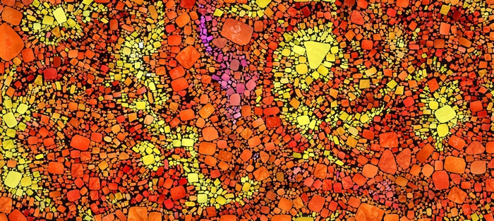 Colorful abstract mosaic with red, orange, and yellow tiles