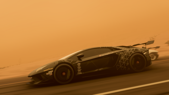 Lamborghini Aventador racing in a desert storm