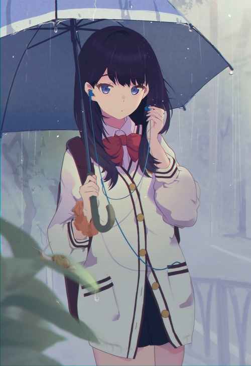 Girl with umbrella in the rain