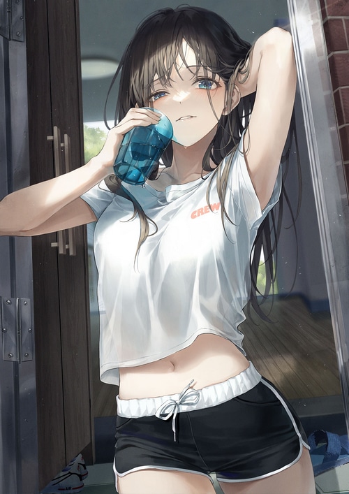 Girl in T-shirt and short shorts drinking water