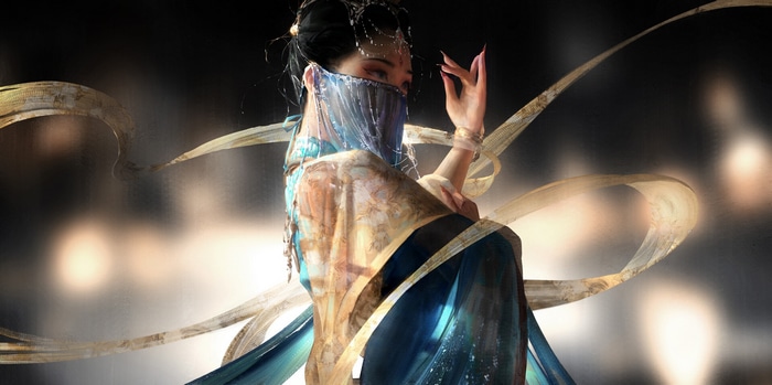 Dancer in traditional Chinese clothing with veils