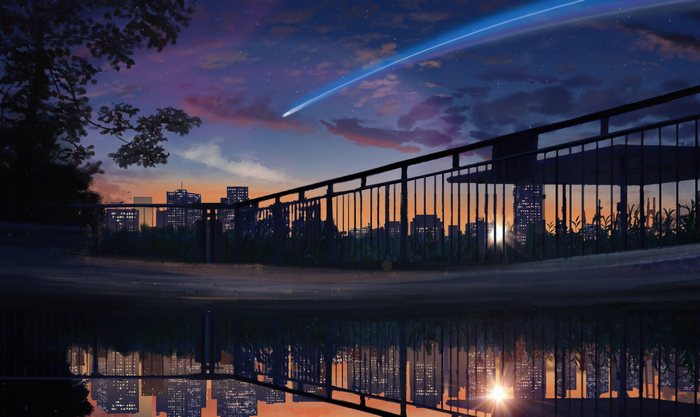 City skyline at sunset with a shooting star