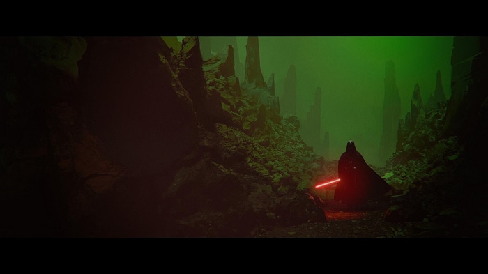 Darth Vader with red lightsaber on a rocky planet