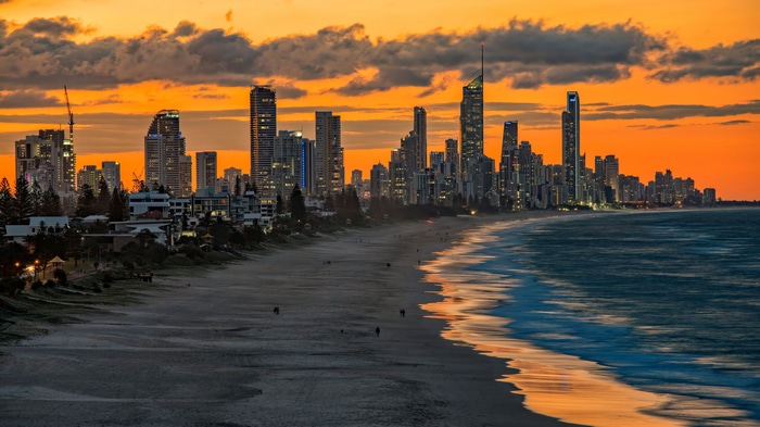 Gold Coast cityscape with beach and ocean at sunset