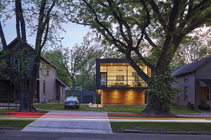 Modern house with large windows and trees