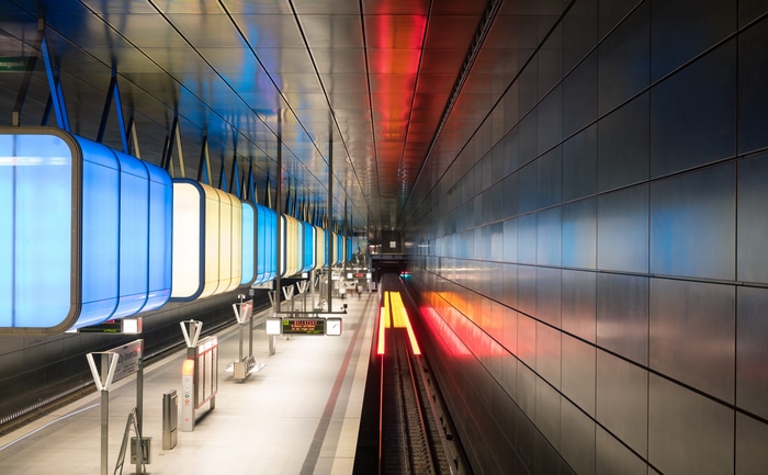 Hamburg subway station with colorful lights and light trails