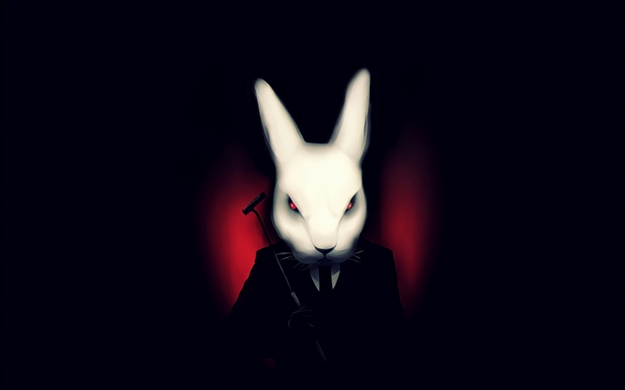 Creepy rabbit with red eyes and fangs