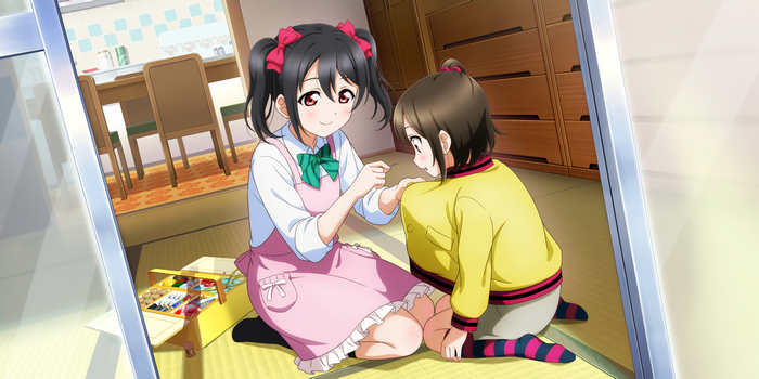 Yazawa Nico and friend sewing in a room