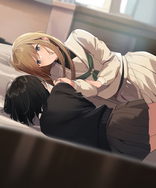 Two schoolgirls lying down in school uniforms