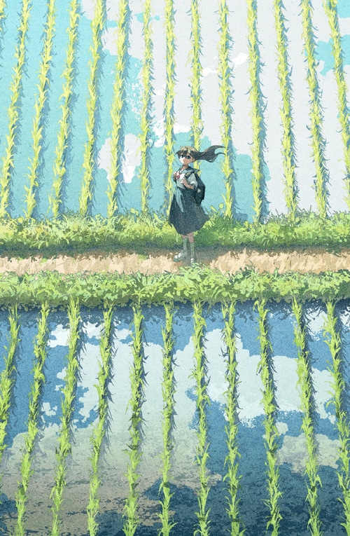 Girl in a school uniform in a rice field