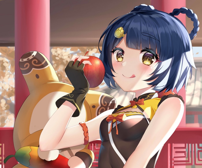 Xiangling holding an apple with Guoba