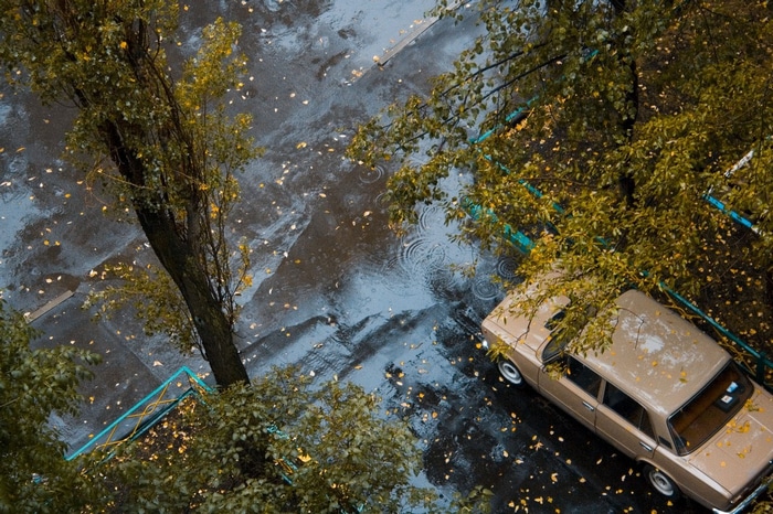 Old LADA car in the rain on a street