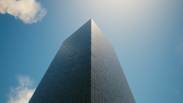 Cyberpunk 2077 building against a blue sky