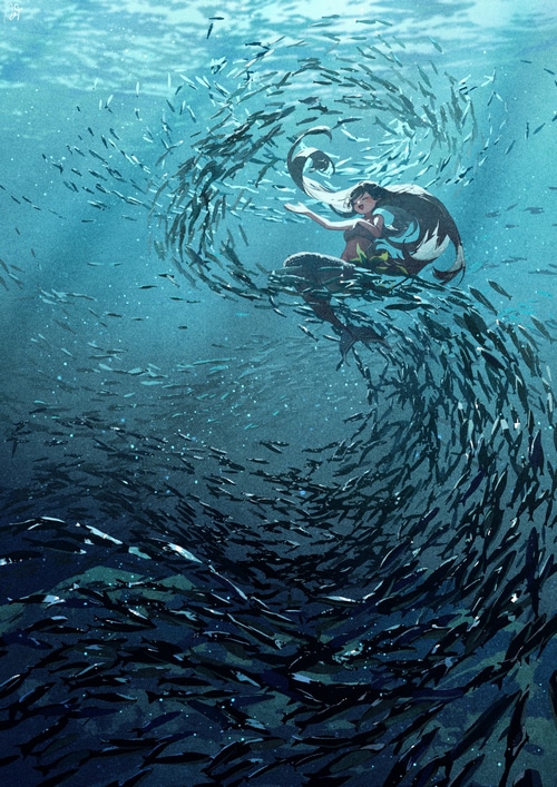 Mermaid surrounded by a swirling school of fish underwater