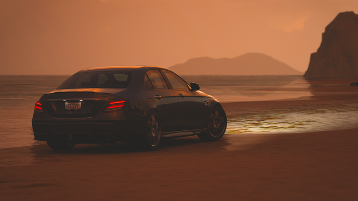 Mercedes-Benz Brabus on a beach at sunset